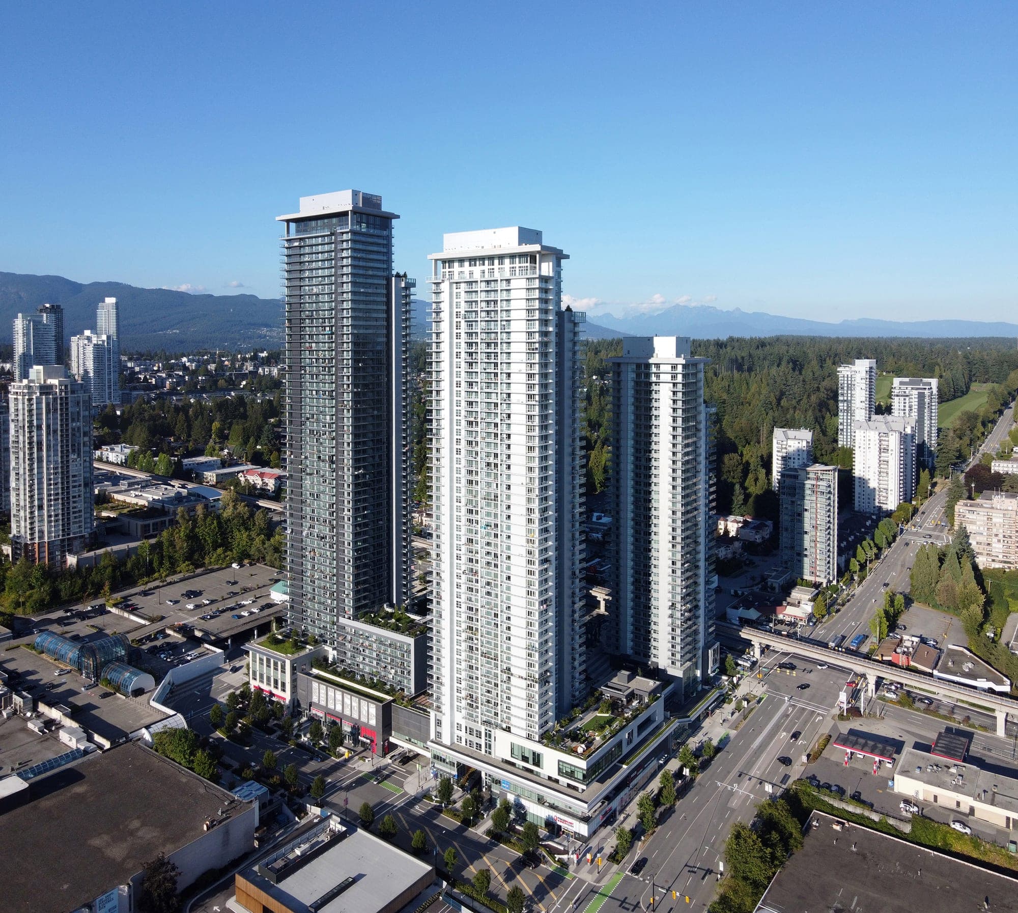 The City of Lougheed development in Burnaby, showing several new high-rise residential towers around the Lougheed Town Centre SkyTrain station.
