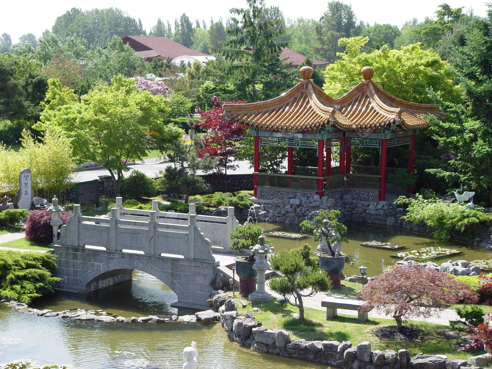 The formal courtyard garden at the International Buddhist Temple in Richmond, BC, with traditional Chinese palace architecture.