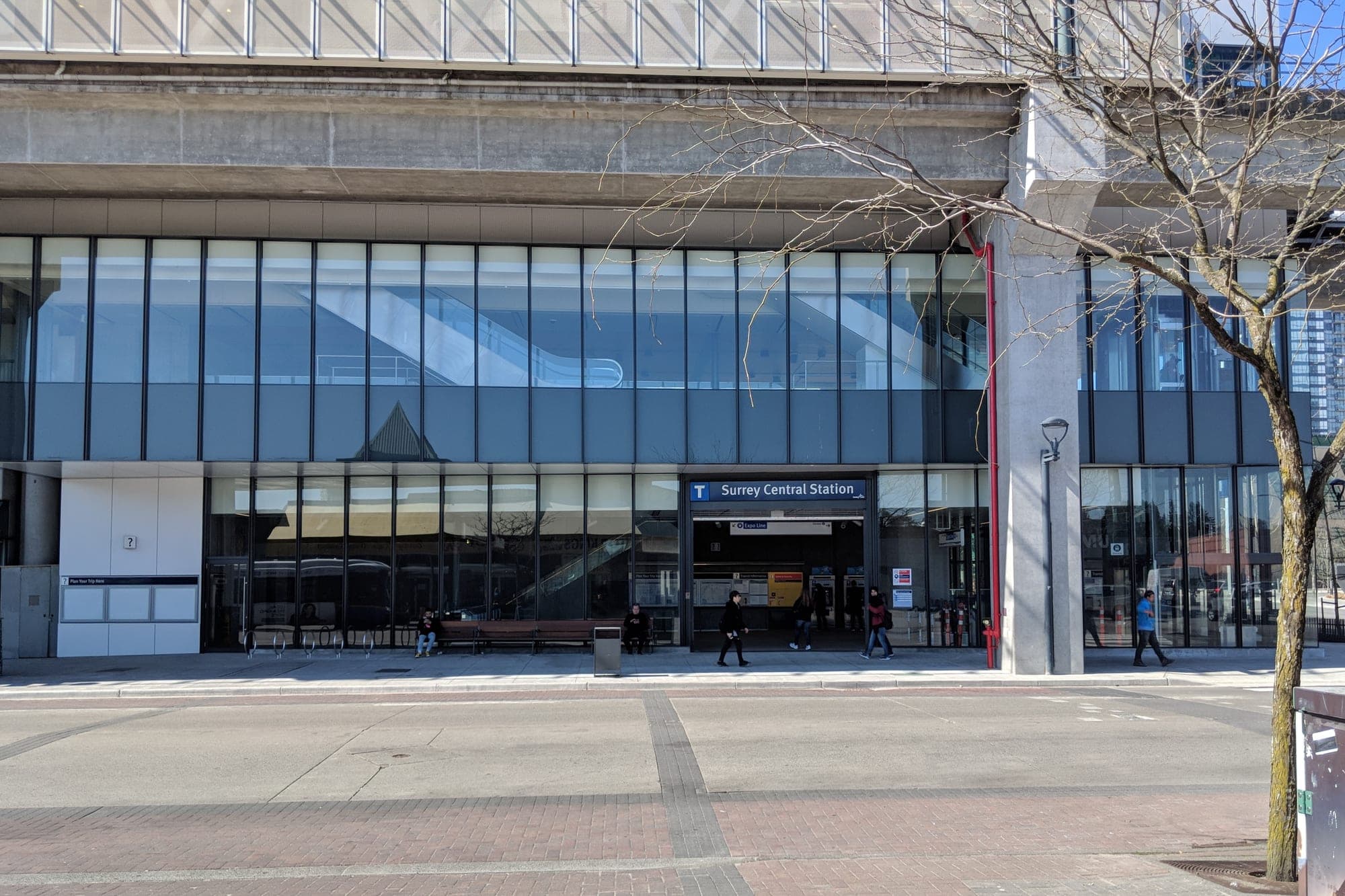 Surrey Central SkyTrain station entrance at City Parkway in downtown Surrey, surrounded by new residential towers.