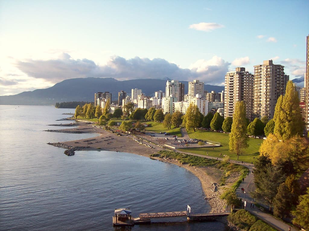 English Bay Beach in downtown Vancouver at golden hour.